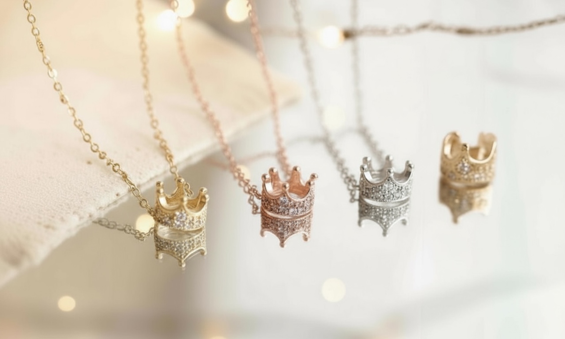 The Crown Collection — gold, rose gold and silver crown pendant necklaces by Eshora